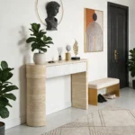 Modern solid oak console table with hidden drawers in an entryway