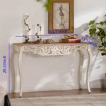 Goldoma French vintage carved distressed white console table in entryway with decor