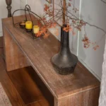 Goldoma rustic farmhouse console table in entryway with antique wood finish