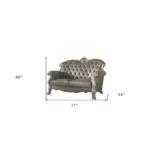 Goldoma 71-inch bone faux leather loveseat with tufted backrest, square arms, and toss pillows