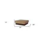 Goldoma 39 inch bronze copper and brown steel square block coffee table in a modern living room