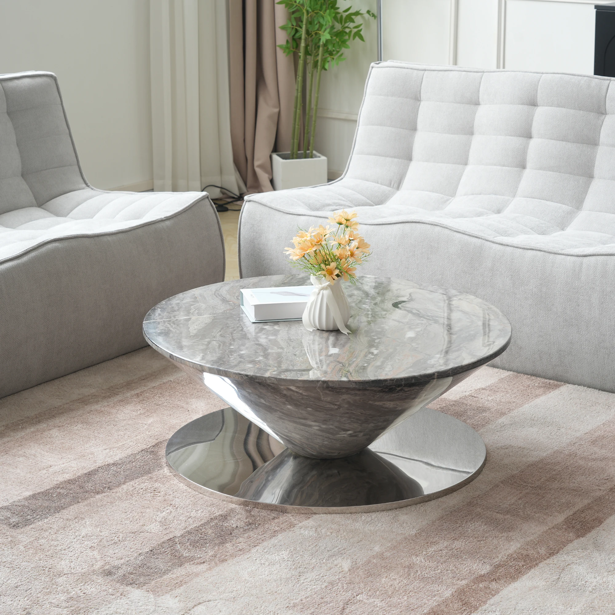 H380c7d4adb7f40f4b44abc5460b21712Z.webp Goldoma modern marbling wood coffee table with round wood top and stainless steel base in a living room