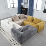 Modern L-shaped sectional sofa with chaise lounge in beige chenille fabric featuring deep seating and side pocket