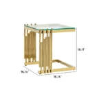 Goldoma gold coffee table set with tempered glass top and gold stainless steel frame in a modern living room