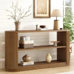 Goldoma solid wood console table with open shelves in a modern entryway