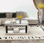 Goldoma lift top coffee table with baked curved mirror surface and wood frame in a modern living room