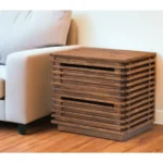 Goldoma 22 inch brown wood block end table with two drawers in a living room setting
