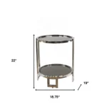 Goldoma 22-inch silver mirrored glass end table with shelf in a living room setting