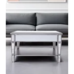 Goldoma 29 inch silver mirrored square coffee table with shelf and drawers in a modern living room