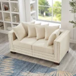 Goldoma convertible velvet loveseat sofa in apricot with tufted back and silver nailheads