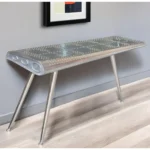 Goldoma 56-inch silver aluminum console table with three wood legs in a modern living room