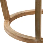 Goldoma 26-inch round end table with clear glass top and brown wood base in a living room setting