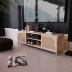Goldoma mid-century modern bamboo TV stand with metal shelves for 60-64 inch TVs in a living room