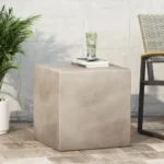 Light grey MGO side table on a patio with a drink and plant, showcasing its weather-resistant outdoor use.