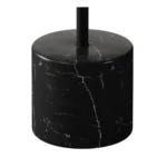 Goldoma 17-inch round farmhouse coffee table with glass top and black metal frame in a modern living room