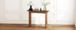 Goldoma solid wood walnut console table – slim mid-century entryway table with rubberwood in a modern living room setting.