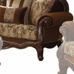 Brown damask chesterfield loveseat with genuine leather, rolled arms, and two toss pillows