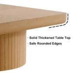 Goldoma nesting coffee table set with natural wood top and black base in modern living room