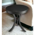 Goldoma 26 inch distressed black end table in a living room setting