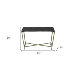 Goldoma 32-inch black and gold console table with stone top and iron frame in a living room entryway