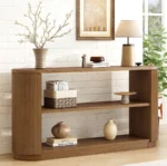 Goldoma solid wood console table with open shelves in a modern entryway