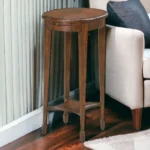 Goldoma 26-inch rustic oval end table with cherry top, dark brown base, and lower shelf for storage
