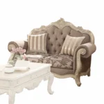 Gray and off-white damask chesterfield loveseat with sleeper function and toss pillows by Goldoma