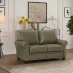 Goldoma black faux leather loveseat with memory foam cushions and wood legs in a modern living room