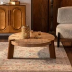 Goldoma round wood coffee table in farmhouse wabi sabi style with natural finish