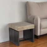 Goldoma 20 inch square end table with natural wood top and iron legs in a living room setting