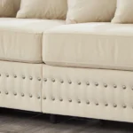 Goldoma convertible velvet loveseat sofa in apricot with tufted back and silver nailheads