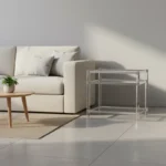 Goldoma 3-tier acrylic coffee table with tempered glass top and stainless steel frame in a modern living room setting