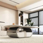 Modern butterfly coffee table with sintered stone top and storage drawer in living room