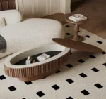 Goldoma 43.7-inch oval drum coffee table in walnut finish with solid wood top and MDF base on a modern living room floor
