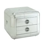 Silver aluminum aviator trunk style square end table with two drawers by Goldoma in living room