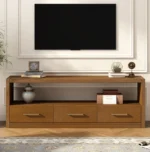 Goldoma modern wood TV stand with adjustable drawers holding a large flat-screen TV in a living room