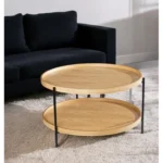 Goldoma 33-inch farmhouse round coffee table with natural wood top and black metal base in a living room