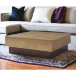 Goldoma 39 inch bronze copper and brown steel square block coffee table in a modern living room