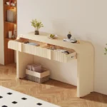 Modern rustic console table in entryway with decor items showcasing solid oak and cross-leg design