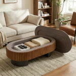 Goldoma 43.7 inch elliptical modern coffee table with hidden storage and removable tabletop in a living room setting