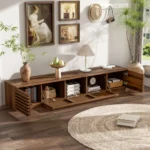 Modern wood TV stand for TVs up to 80 inches with cable management and soft-close hinges in a living room