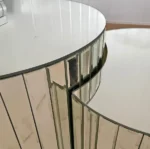 Goldoma adjustable height coffee table with glass top and wood frame in modern living room