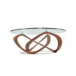 Goldoma 39 inch round clear glass coffee table with brown solid wood base in a modern living room