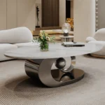 Goldoma Sculptural Coffee Table with Faux Marble Top and Stainless Steel Base