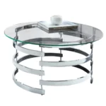 Goldoma round coffee table with chrome base and tempered glass top in modern living room
