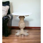 Goldoma 26 inch brown marble and solid wood round end table in a living room setting