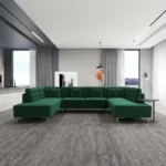 Goldoma U-shaped modular sofa set in green velvet with reclining seats in a modern living room