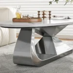 Modern sintered stone coffee table with stainless steel base in a stylish living room setting