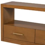 Goldoma modern wood TV stand with adjustable drawers holding a large flat-screen TV in a living room