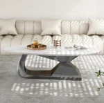 Modern sintered stone coffee table with stainless steel base in a stylish living room setting